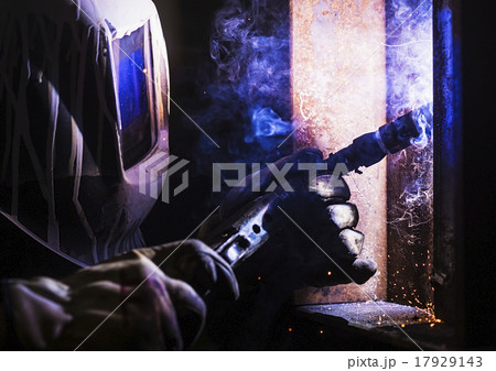 Man in welding mask working Man in welding mask working 17929143