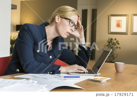 Woman working at desk  17929171