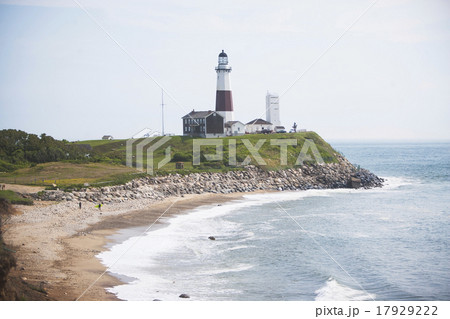 Lighthouse on cliff over sea Lighthouse on cliff over sea 17929222