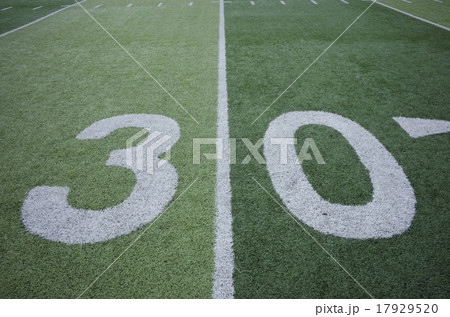 Football field marking of 30 yard line Football field marking of 30 yard line 17929520