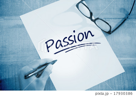 Passion against left hand writing on white page on working desk Passion against left hand writing on white page on working desk 17930386