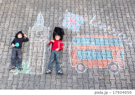 Two kid boys in policeman uniform with London Two kid boys in policeman uniform with London 17934050