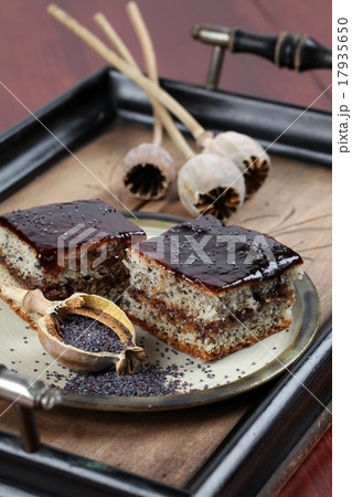 Poppy seed sponge cake with plum jam Poppy seed sponge cake with plum jam 17935650