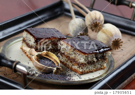 Poppy seed sponge cake with plum jam Poppy seed sponge cake with plum jam 17935651