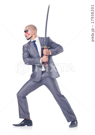 Businessman with sword isolated on white Businessman with sword isolated on white 17936201
