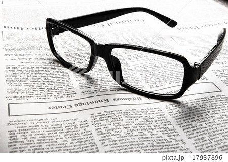Glasses on newspaper Glasses on newspaper 17937896