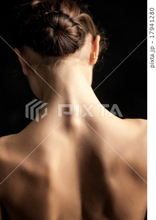 Beautiful woman, back view on dack background 17941280