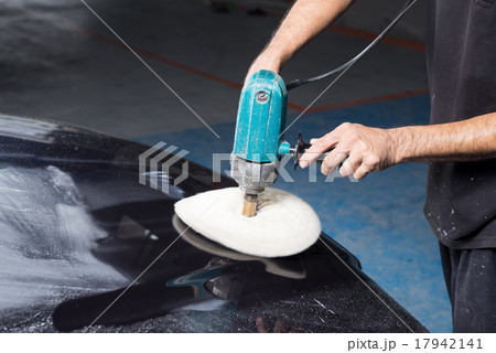 Car polishing series : A man waxing blue car 17942141