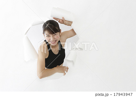 飛び出す女性 の写真素材