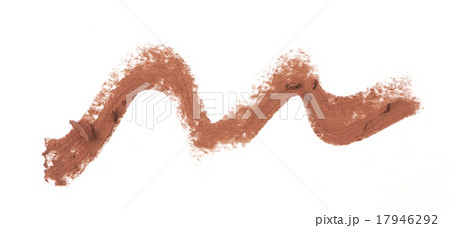 Brown color lipstick stroke on white background 17946292