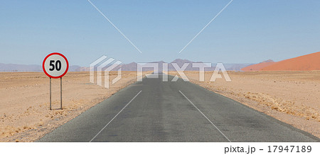 Speed limit sign at a desert road in Namibia 17947189