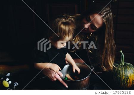mother and daughter playing together at home mother and daughter playing together at home 17955158