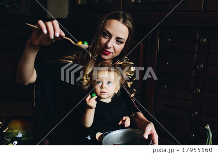 mother and daughter playing together at home mother and daughter playing together at home 17955160