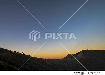 Daybreak at mountain rim with tourists enjoy view Daybreak at mountain rim with tourists enjoy view 17974543