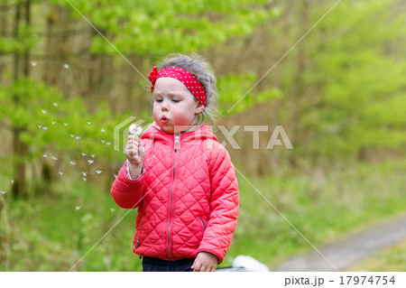 Pretty little girl relax at beauty summer landscape background Pretty little girl relax at beauty summer landscape background 17974754