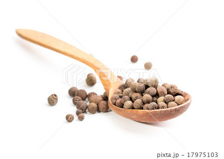 Aromatic allspice in wooden spoon 17975103