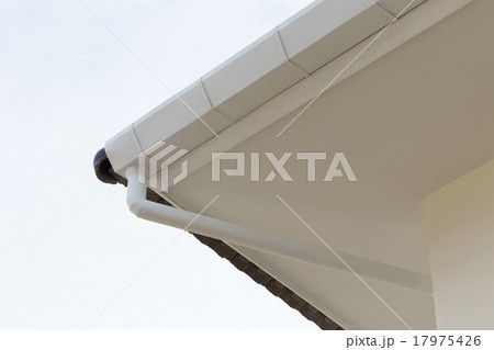 gutter on the roof top of house 17975426