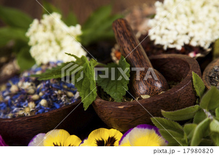 Natural medicine, wooden table background 17980820