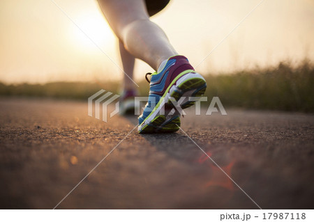 Woman fitness, Runner feet running . 17987118