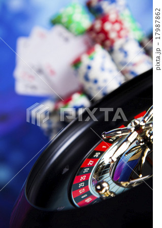 Poker Chips on a gaming with casino roulette Poker Chips on a gaming with casino roulette 17987862