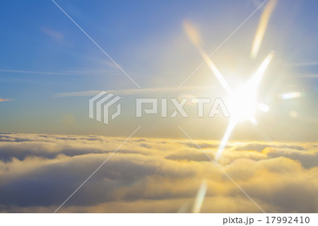 high above the clouds close to sun 17992410