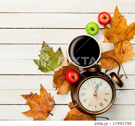 Cup and pumpkin with leafs Cup and pumpkin with leafs 17993790