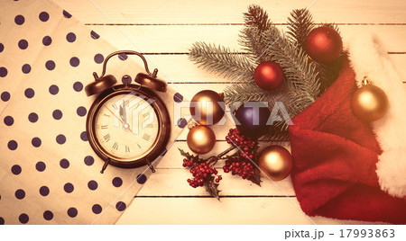 Alarm clock and christmas baubles Alarm clock and christmas baubles 17993863