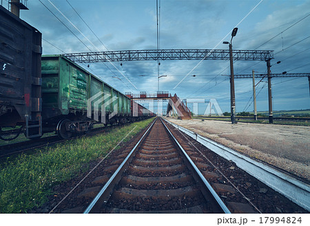 Cargo train platform at sunset. Railroad. Railway 17994824