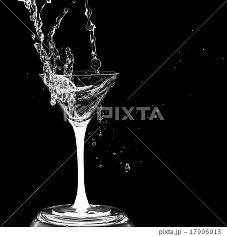 Cocktail glass with splashes isolated  17996913