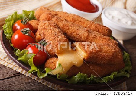 Hot fried cheese close-up on a plate Hot fried cheese close-up on a plate 17998417