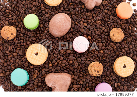 Cookies on coffee beans with macaroons. Cookies on coffee beans with macaroons. 17999377