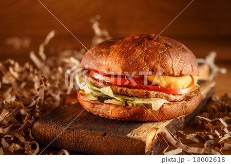 Burger on wood background 18002618