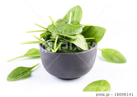 Green spinach on a white background 18006141