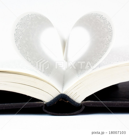 Book with pages folded into a heart shape Book with pages folded into a heart shape 18007103