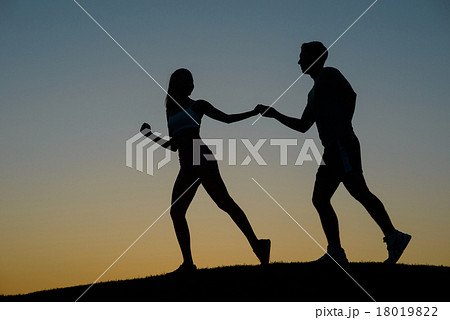 Guy and girl holding hands. Guy and girl holding hands. 18019822