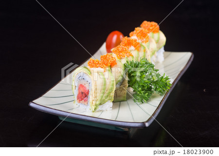 japanese cuisine. sushi on the background japanese cuisine. sushi on the background 18023900