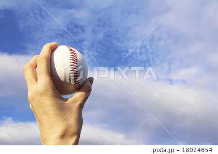 野球のボールと青空の写真素材