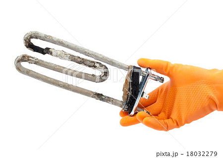 Damaged heating element of washing machine in hand 18032279