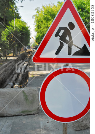 Road signs in street under reconstruction Road signs in street under reconstruction 18033558