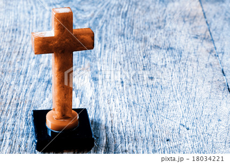 Beautiful old cross with jesus on the old floor 18034221