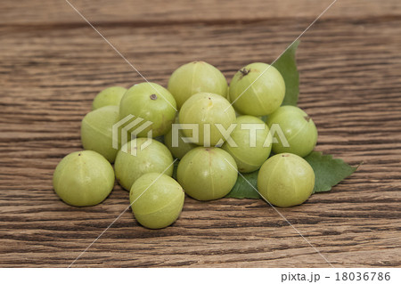 Fresh Indian gooseberry on wooden background 18036786