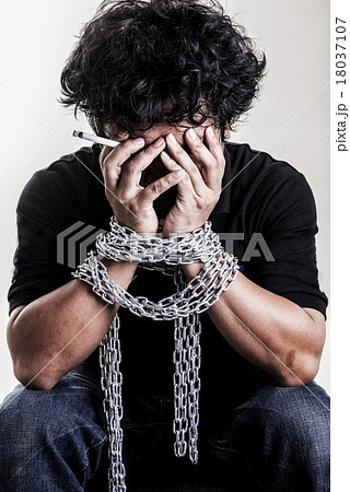 Drugs Man fists in strained chains 18037107