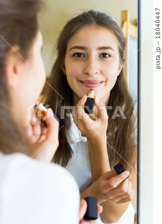 young girl admiring himself young girl admiring himself 18040447
