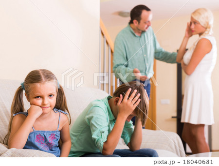 Children in silence while parents arguing Children in silence while parents arguing 18040681