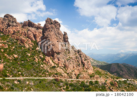 Landscape of Corsica with turning mountain road 18042100