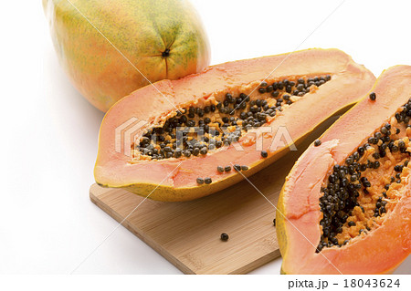 Papaya Halved With A Longitudinal Cut Papaya Halved With A Longitudinal Cut 18043624