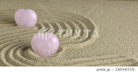 Rose Quartz heart in zen garden 18048550