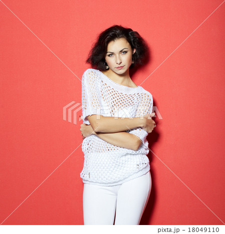 girl on red background portrait 18049110
