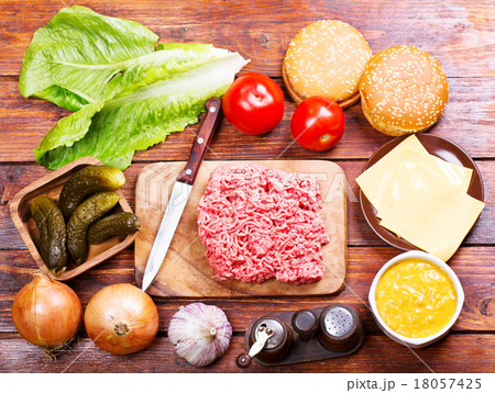 Raw beef for hamburger with vegetables Raw beef for hamburger with vegetables 18057425
