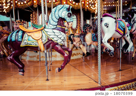 Old French carousel in a holiday park. Old French carousel in a holiday park. 18070399